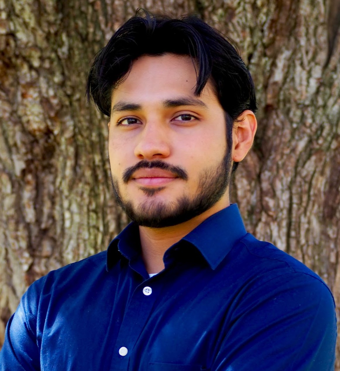 Professional headshot of Andrés Gonzales